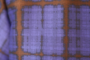Closeup of fabric.  It is a jacquard weave, as well as a plaid.  Swoon.